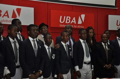 Pix of UBA Foundation's 2013 National Essay Competition 4: Divisional Head, Marketing and Corporate Relations, UBA Plc, Mr. Charles Aigbe; Managing Director, UBA Foundation, Ms. Ijeoma Aso; Vice Principal, Kings College, Mr. Charles Utomi ; and a judge and Professor Ralph Akinfeleye, with students of Kings College, Lagos, during the press launch announcing Call for Entries for 2013 UBA Foundation National Essay Competition for Secondary Schools in Nigeria, held in Lagos recently